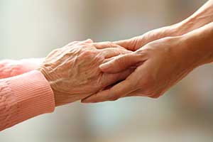 helping hand elderly woman